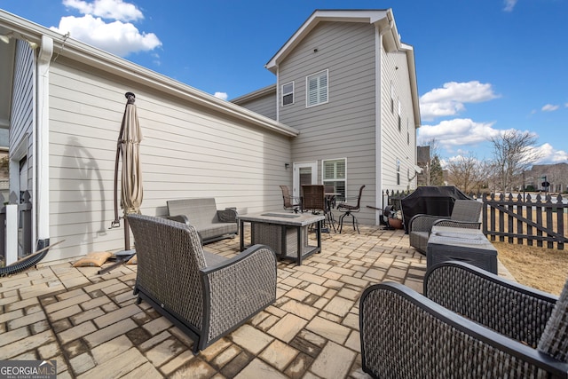 view of patio / terrace with outdoor lounge area and a grill