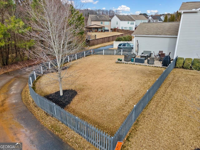 view of yard with an outdoor living space and a patio