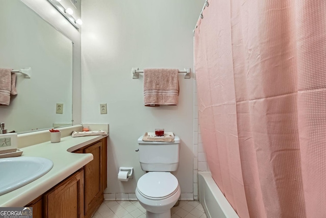 full bathroom with vanity, shower / bath combination with curtain, and toilet