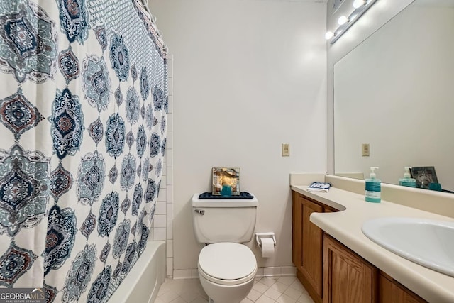 full bathroom featuring tile patterned flooring, shower / bath combo, vanity, and toilet