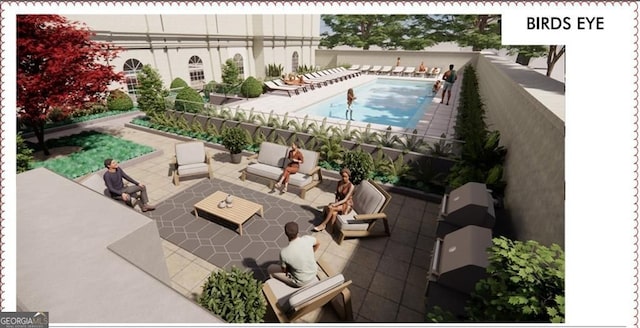 view of pool with a patio area