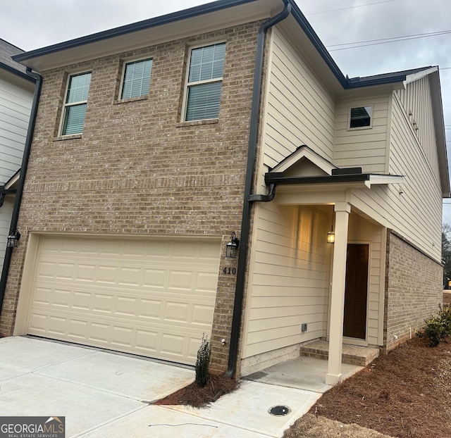 view of front of property featuring a garage