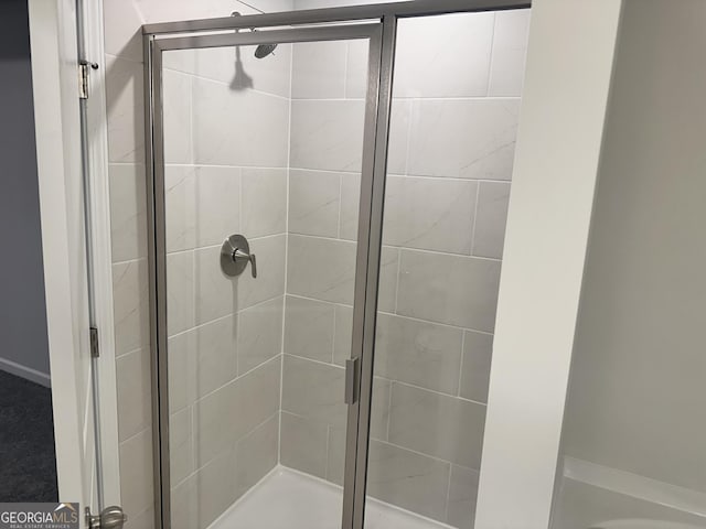 bathroom featuring walk in shower