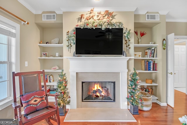 entryway featuring light hardwood / wood-style flooring and crown molding