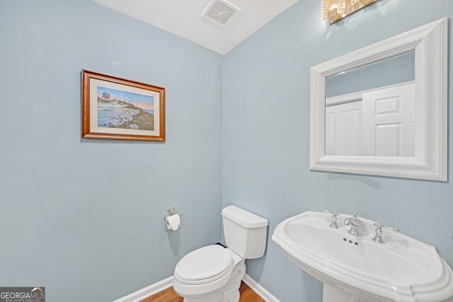 interior space with light hardwood / wood-style floors and ornamental molding