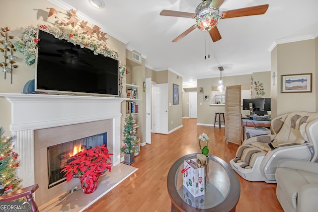 kitchen featuring white cabinets, ceiling fan, backsplash, and appliances with stainless steel finishes