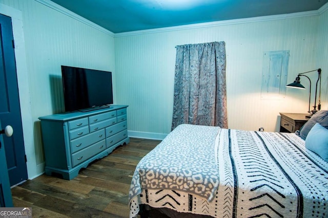 bedroom with dark wood-type flooring and ornamental molding