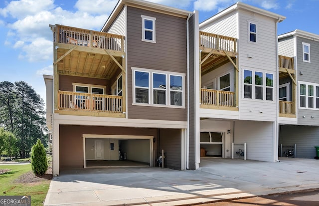 rear view of house with a garage