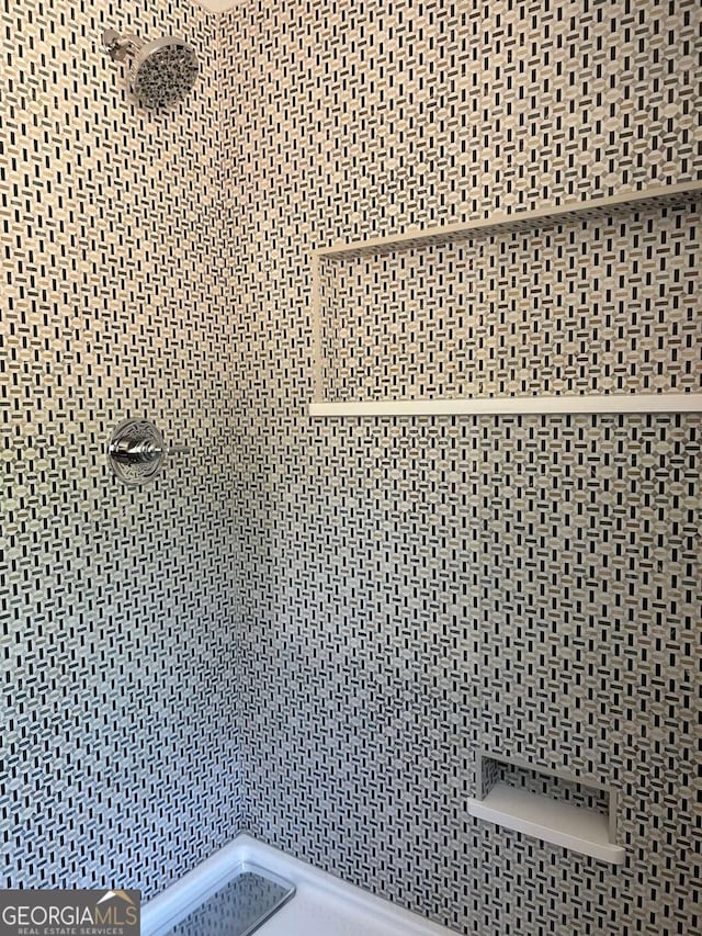 interior space featuring walk in shower