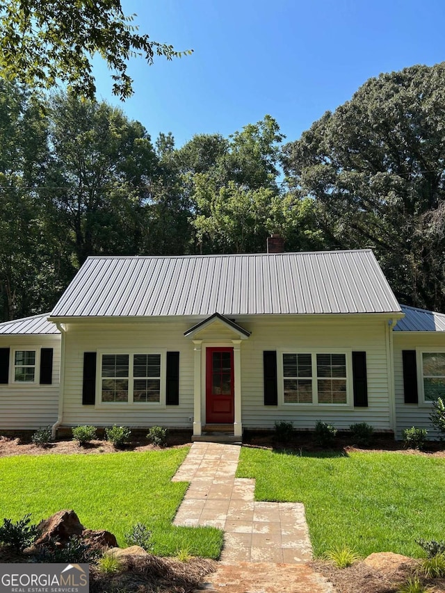 ranch-style house with a front yard