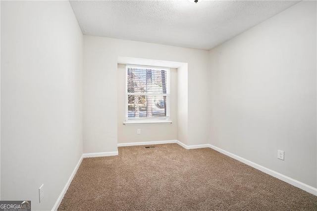 empty room featuring carpet