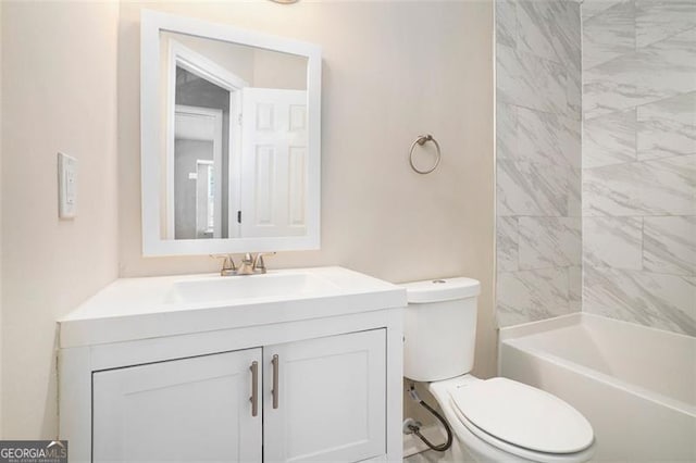 full bathroom with vanity, toilet, and tiled shower / bath