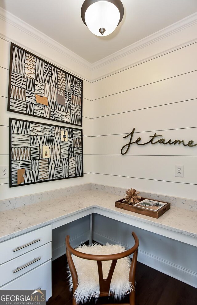 office featuring dark hardwood / wood-style flooring and ornamental molding