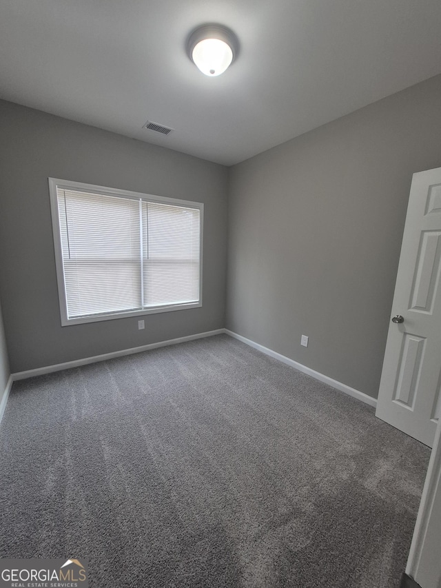 empty room featuring carpet