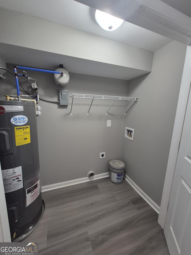 laundry area featuring hookup for an electric dryer, dark hardwood / wood-style floors, electric water heater, and hookup for a washing machine