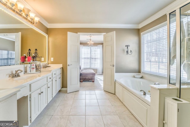 bathroom with tile patterned flooring, vanity, crown molding, and a washtub