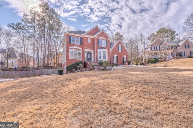 view of front of property featuring a front lawn