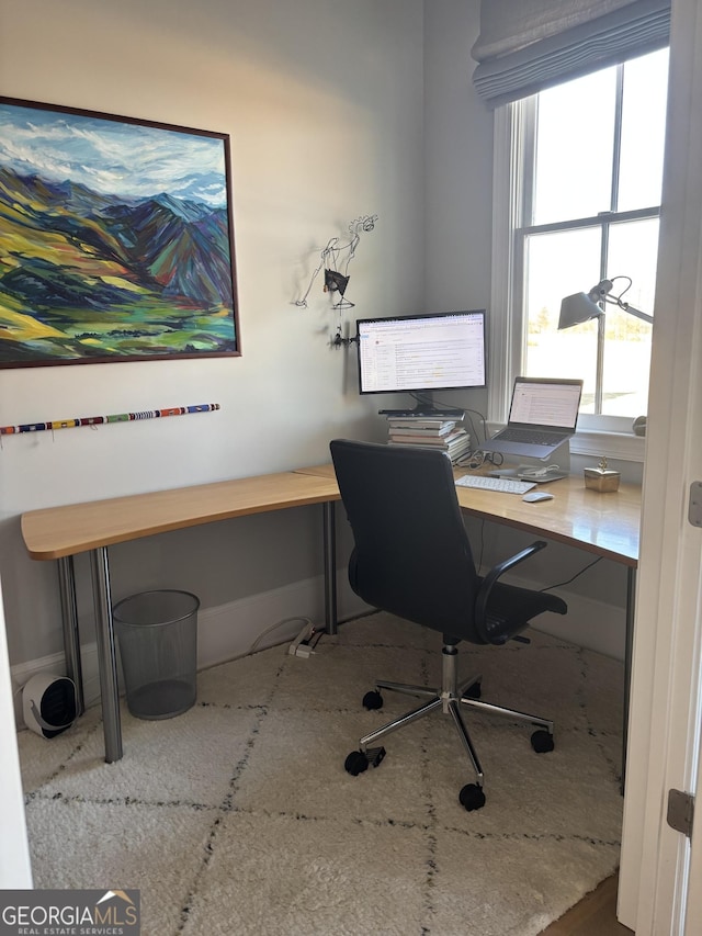 home office featuring baseboards