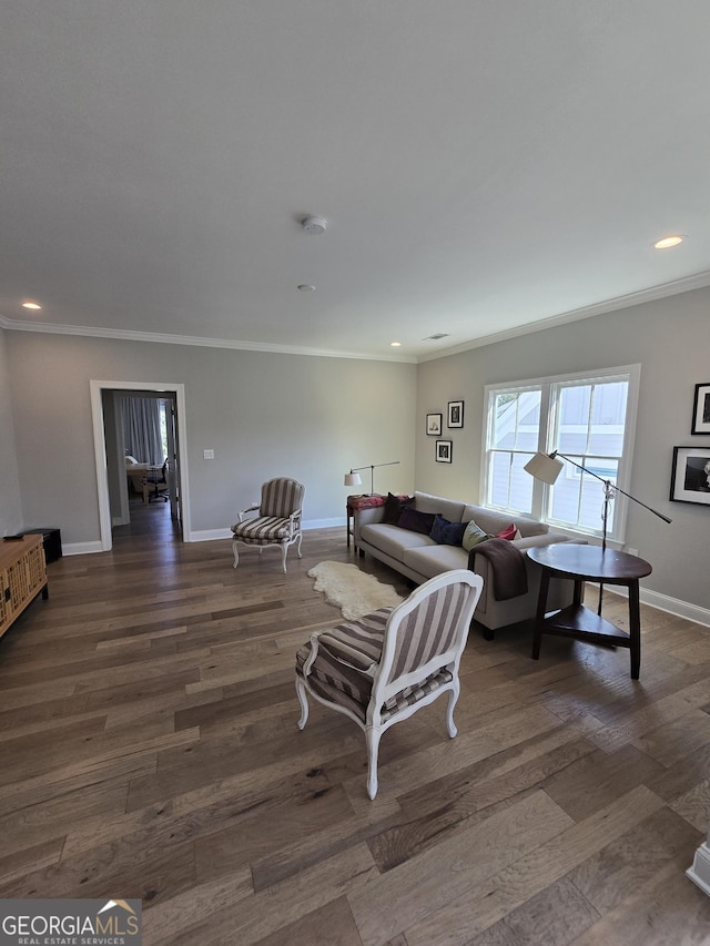 living area featuring ornamental molding, recessed lighting, dark wood-style flooring, and baseboards