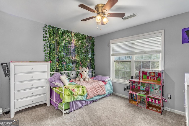 bedroom featuring ceiling fan and light colored carpet