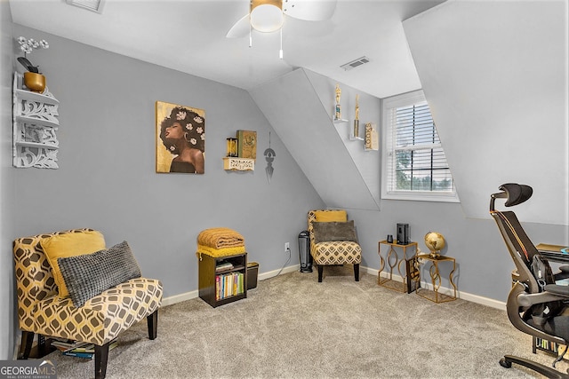 carpeted office featuring vaulted ceiling and ceiling fan