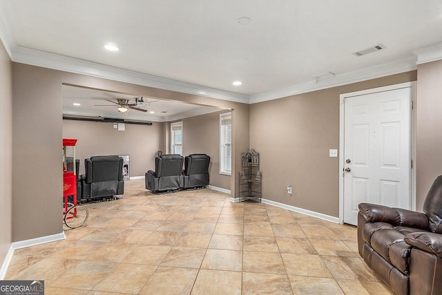 living room featuring ceiling fan and ornamental molding