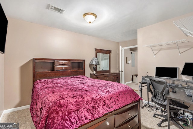 bedroom with light carpet