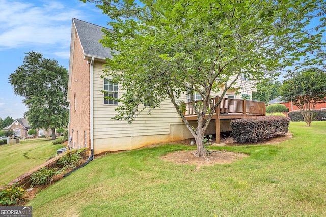 view of yard with a deck