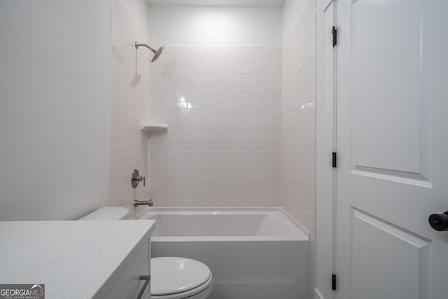 bathroom with shower / tub combination, vanity, and toilet