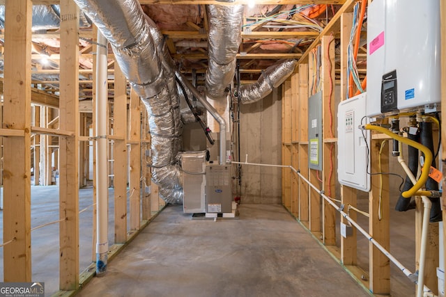 unfinished basement with heating unit, electric panel, and tankless water heater