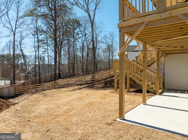 wooden deck with ceiling fan