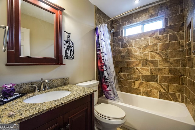 full bathroom with shower / bath combo, vanity, and toilet