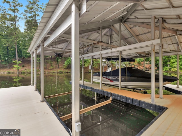 dock area featuring a water view