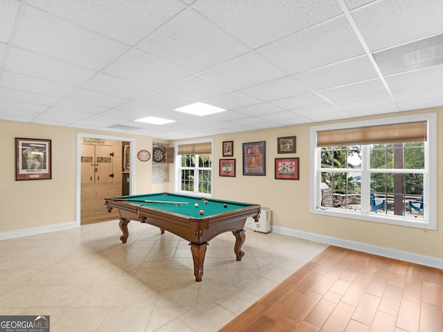 rec room with a drop ceiling, light tile patterned floors, and billiards