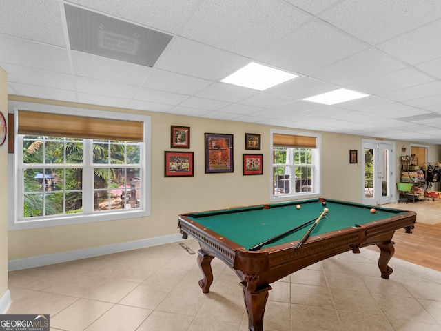 recreation room featuring a paneled ceiling, french doors, and pool table