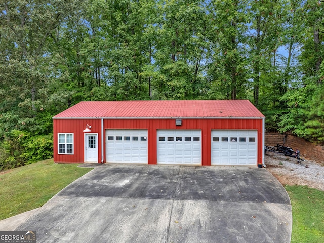 garage with a lawn