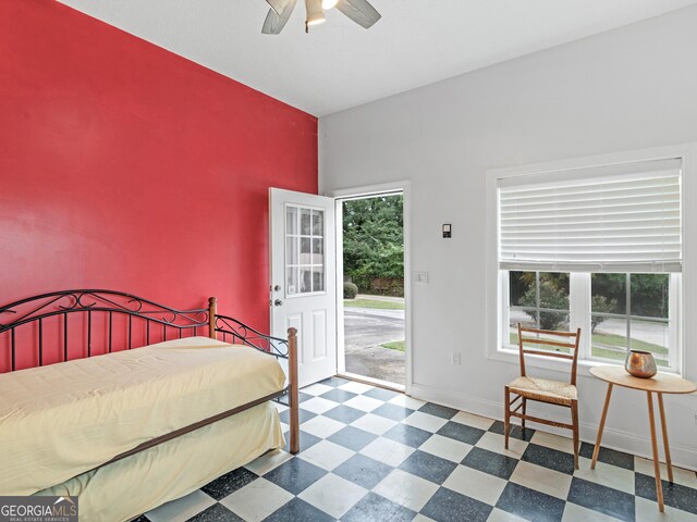 bedroom with ceiling fan, access to outside, and multiple windows