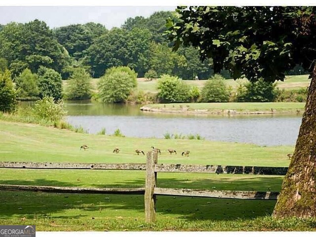 view of water feature with a rural view