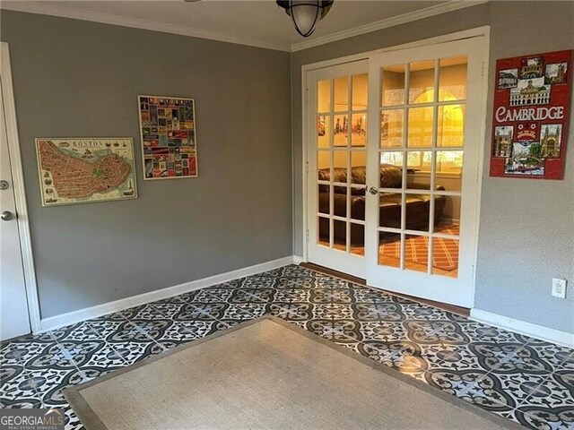 entryway with french doors and ornamental molding