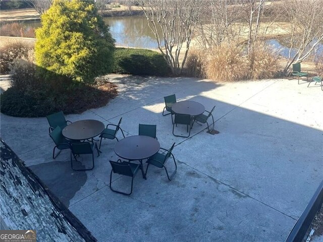 view of patio / terrace featuring a water view