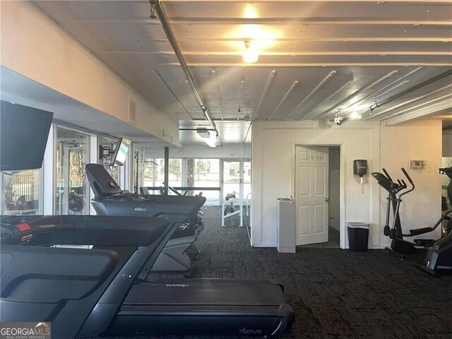 workout area featuring carpet floors