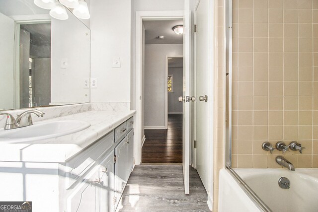 2540 Thornton Dr, Atlanta, GA 30349 - unfurnished bedroom featuring dark wood-type flooring and a closet