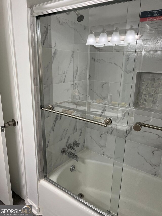 2540 Thornton Dr, Atlanta, GA 30349 - interior details featuring stainless steel refrigerator with ice dispenser, a brick fireplace, hardwood / wood-style flooring, ceiling fan, and ornamental molding