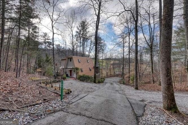 view of road featuring aphalt driveway