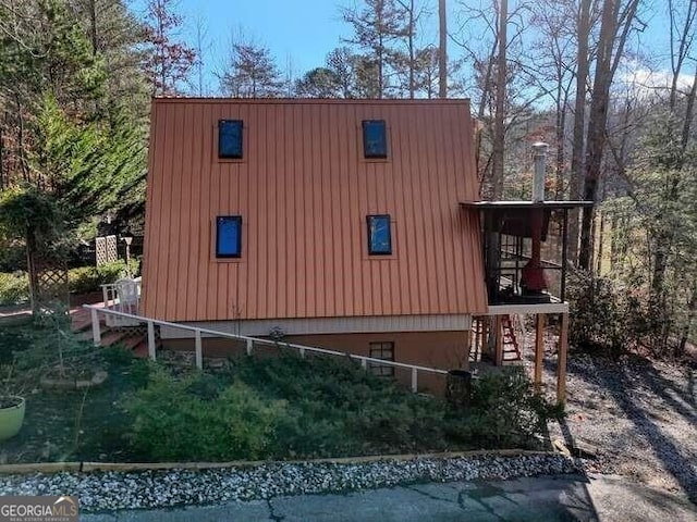 view of home's exterior featuring stairway