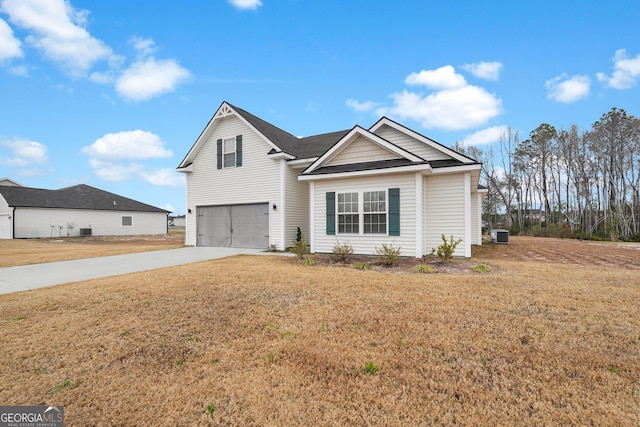 view of front of home with cooling unit, a front lawn, and a garage