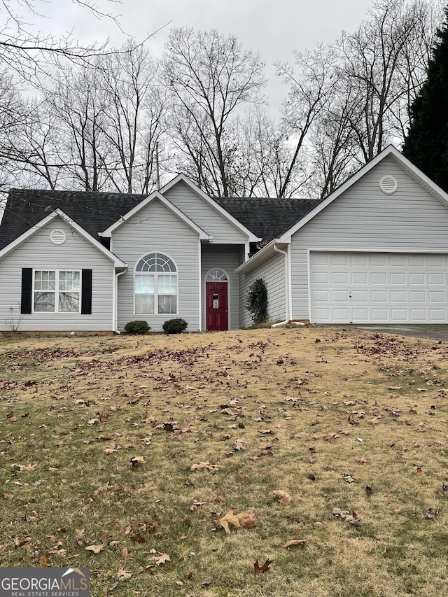 single story home with a garage