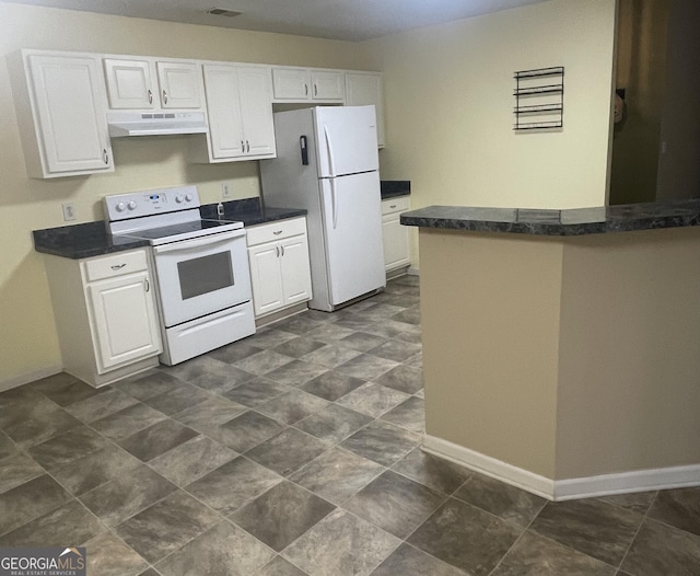 kitchen with white cabinets, white appliances, and kitchen peninsula