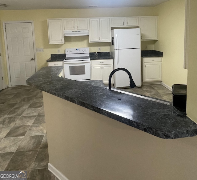 kitchen with white cabinetry and white appliances