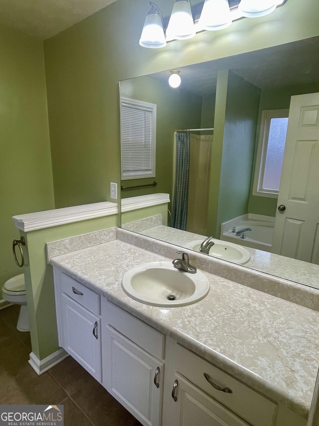 full bathroom featuring separate shower and tub, tile patterned flooring, vanity, and toilet